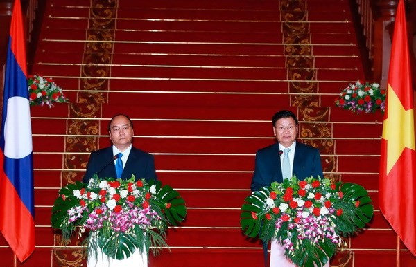 Vietnam, Laos to boost traditional ties, special solidarity  - ảnh 1